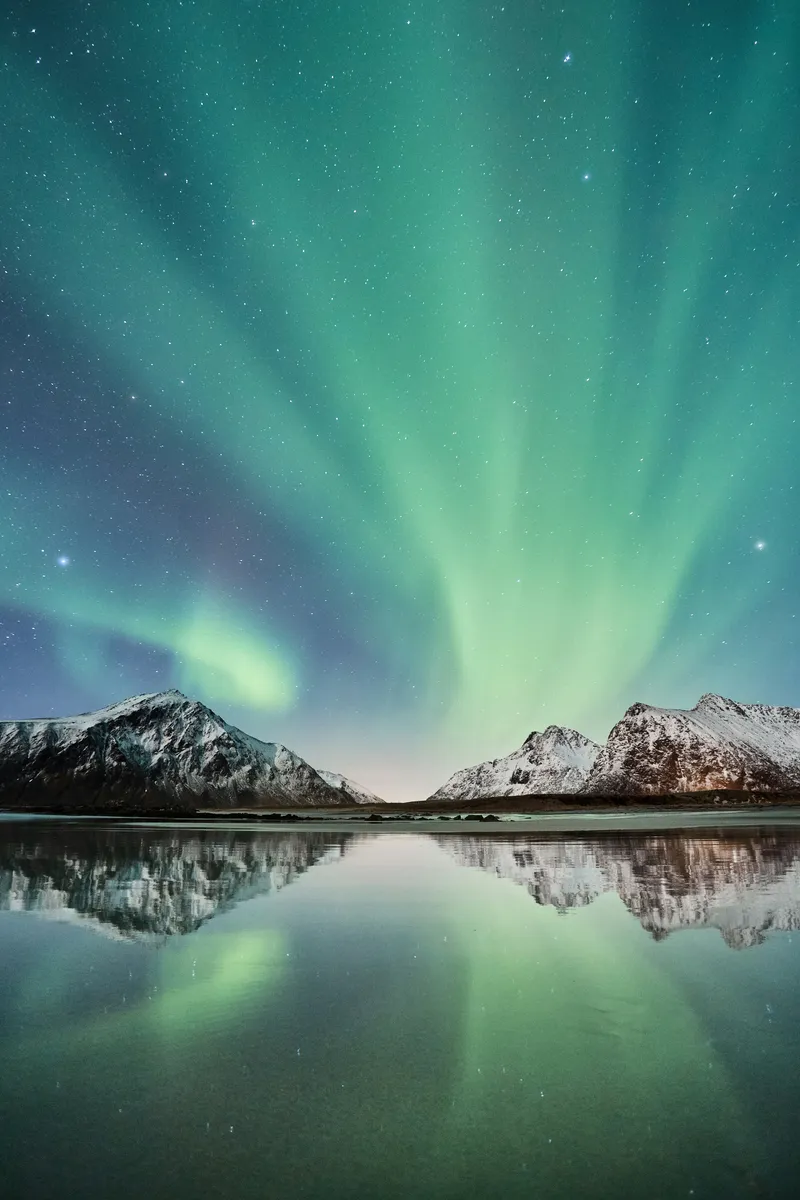 Northern lights over mountains, Norway